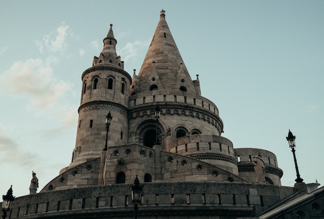 A photo of some stone towers, clustered together
